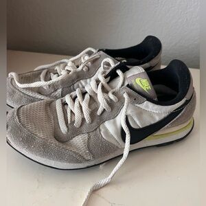 Nike Women’s White and Black Sneakers